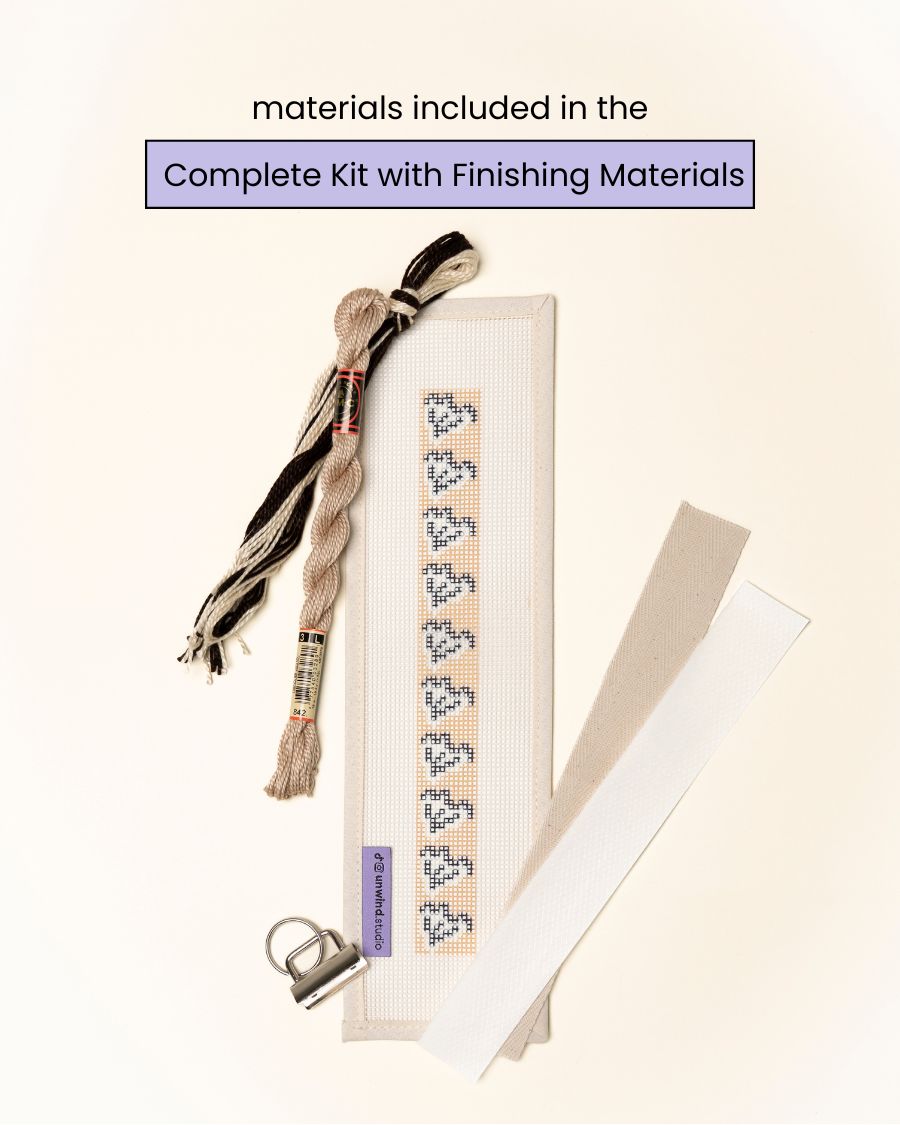 flat view of theClay Leaf Key Fob Needlepoint Kit with printed canvas, matching threads and finishing materials.