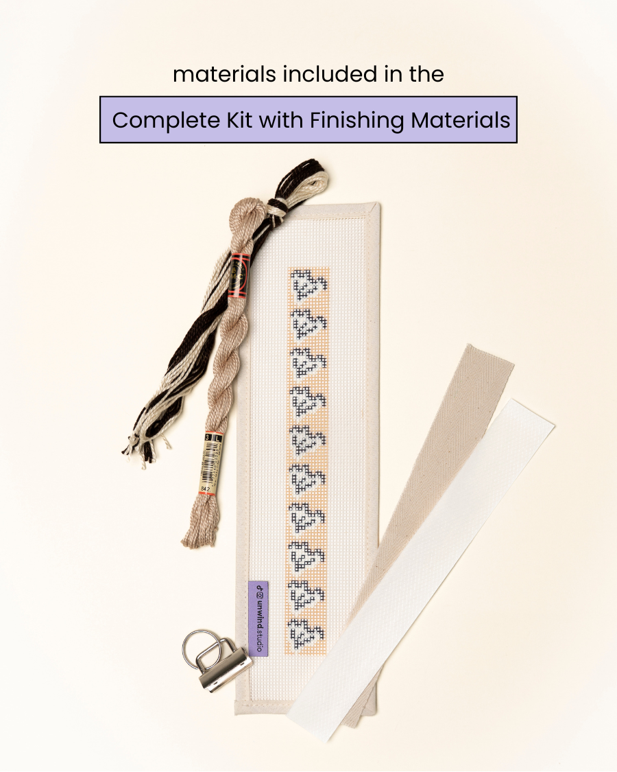 flat view of theClay Leaf Key Fob Needlepoint Kit with printed canvas, matching threads and finishing materials.