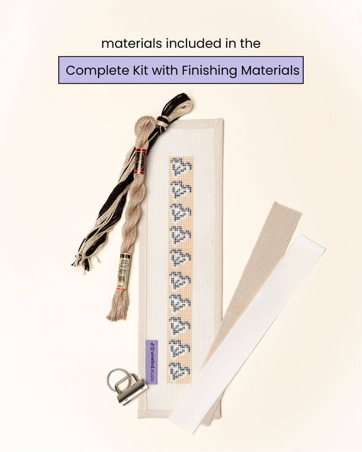 flat view of theClay Leaf Key Fob Needlepoint Kit with printed canvas, matching threads and finishing materials.