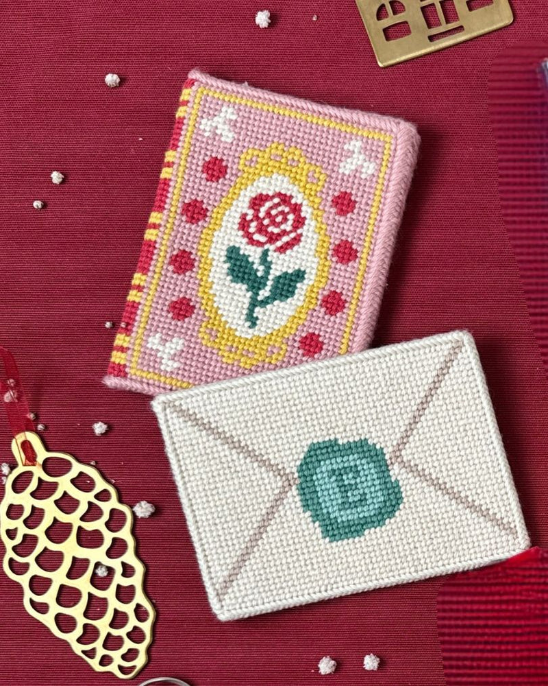 Needlepoint bag charm and magnet kits by Unwind Studio