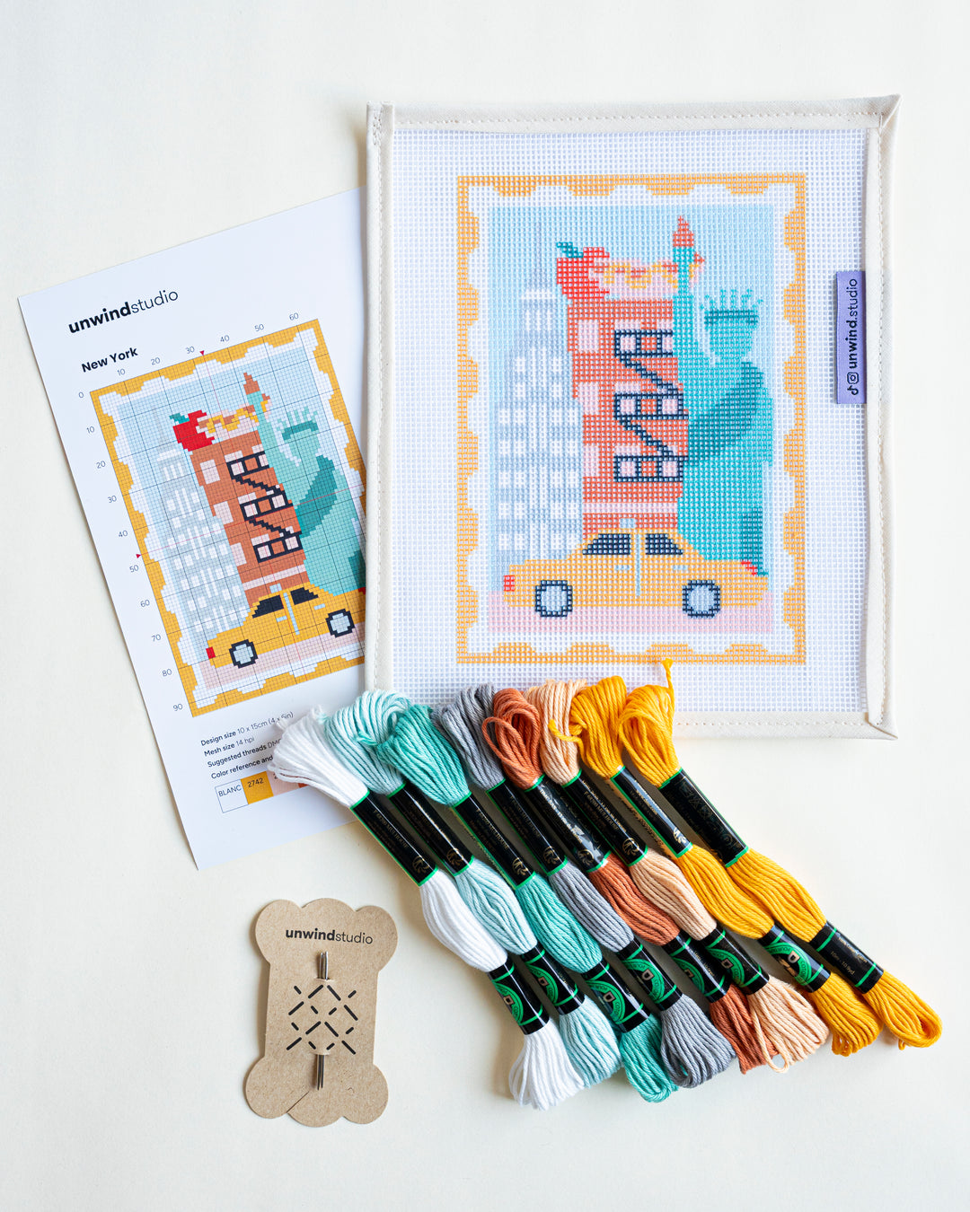 New York Stamp Needlepoint Kit with matching threads and instructional flyer
