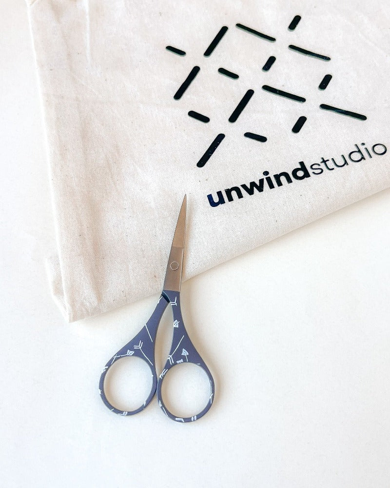 Purple embroidery scissors with cute designs, by Unwind Studio.