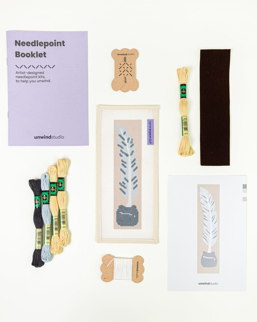 Complete needlepoint bookmark kit for the Quill Pen design, including the canvas, a instructional booklet, DMC Soft Cotton Threads, finishing materials and flyer.