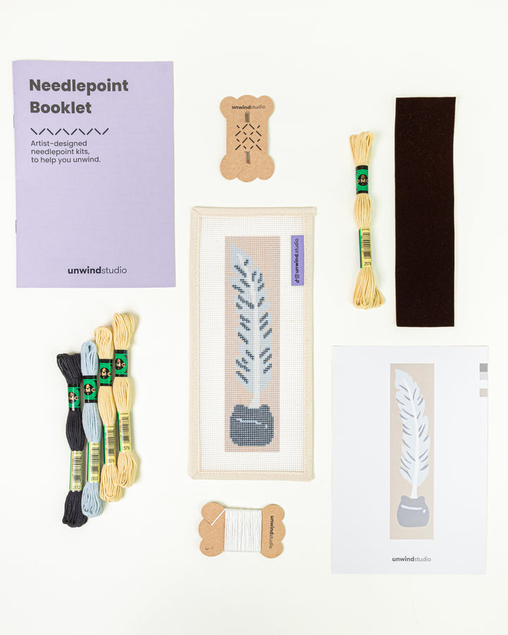 Complete needlepoint bookmark kit for the Quill Pen design, including the canvas, a instructional booklet, DMC Soft Cotton Threads, finishing materials and flyer.