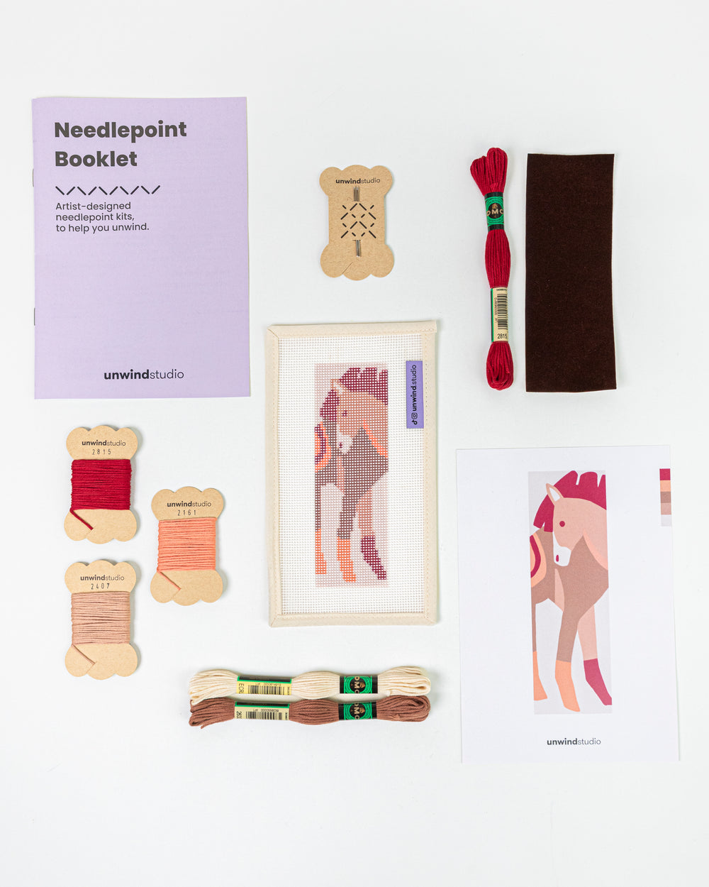 Complete needlepoint bookmark kit for The Horse Spirit design, including the canvas, a instructional booklet, DMC Soft Cotton Threads, finishing materials and flyer.