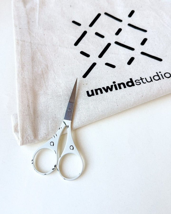 White embroidery scissors with cute designs, by Unwind Studio.