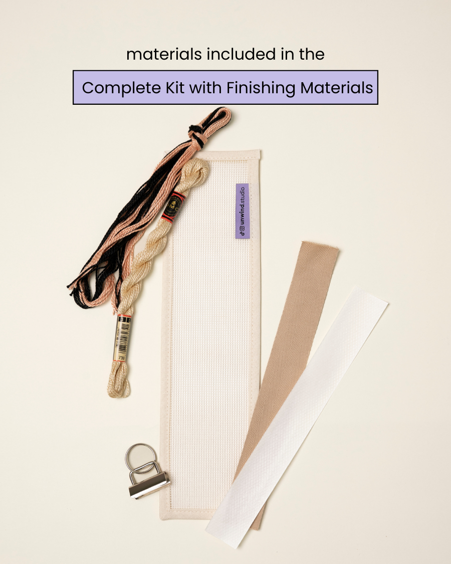 flat view of the Echo Key Fob Needlepoint Kit with blank canvas, matching threads and finishing materials.