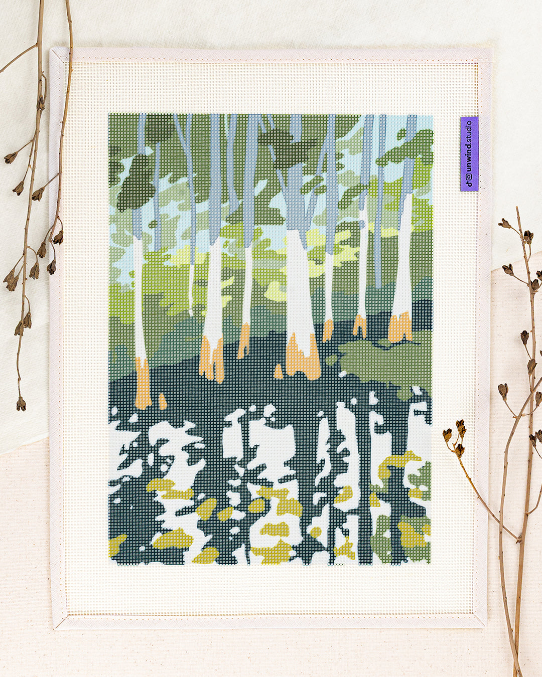 everglade cypress needlepoint kit by elizabeth lang: printed canvas of green florest, framed with dried twigs