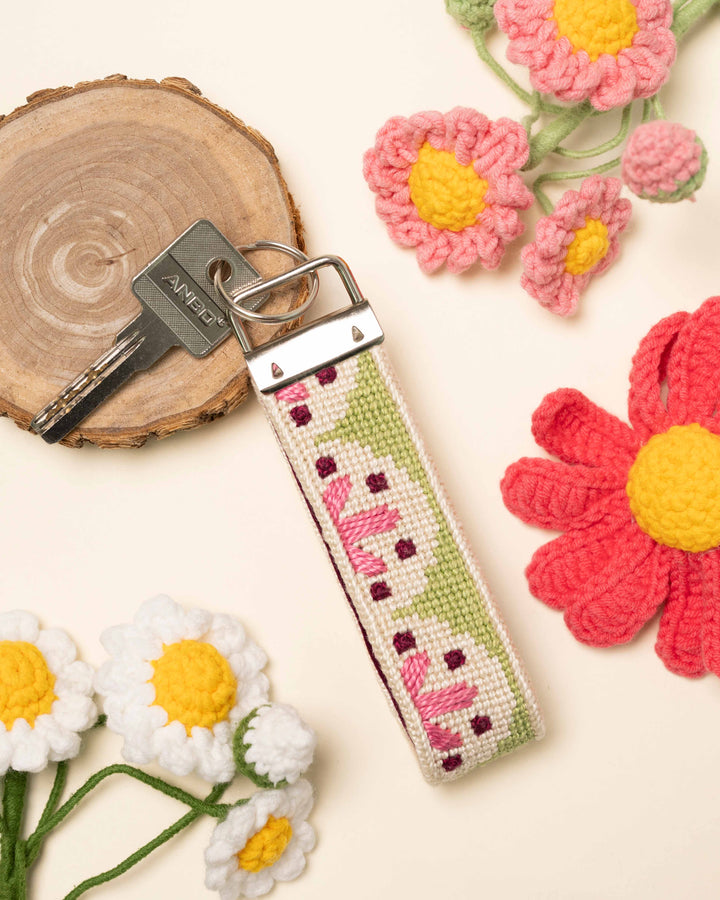 Flourish Key Fob with crochet flowers in the background