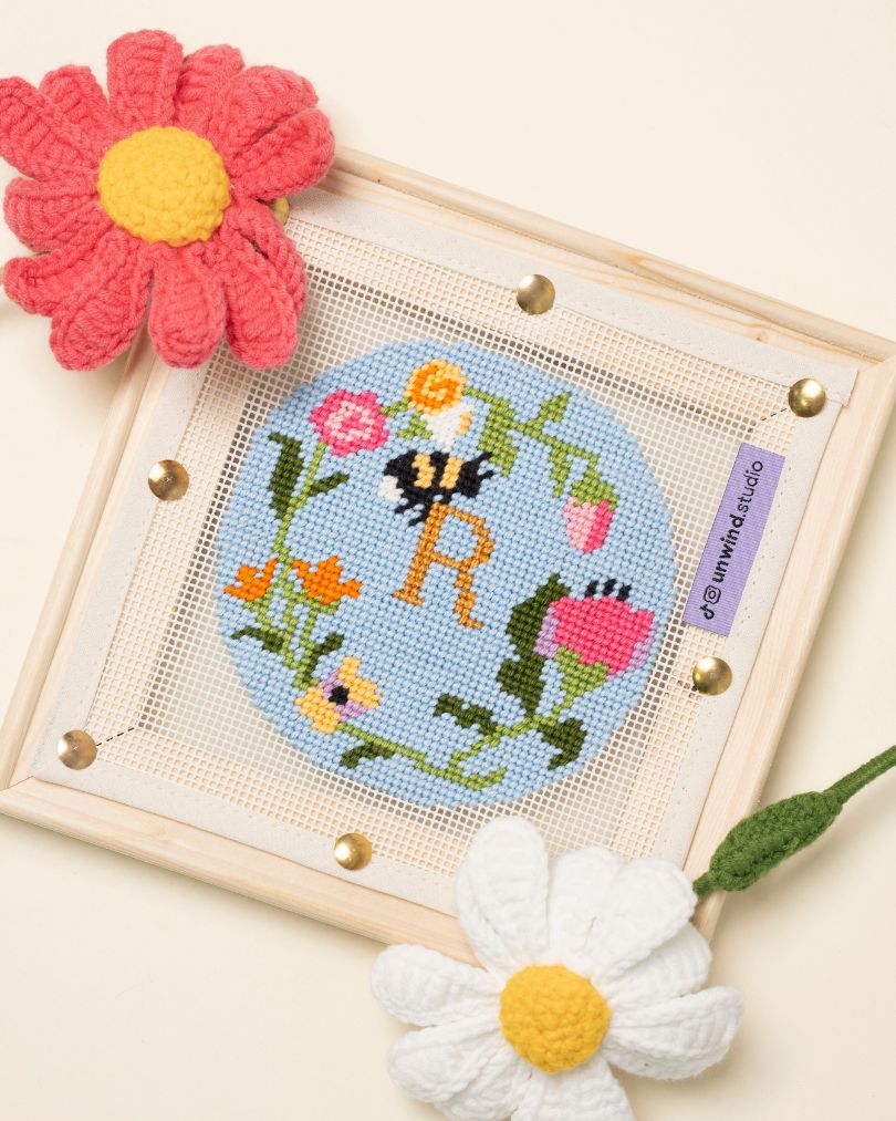 Garden Bee ornament fully stitched with the lettering R in the middle