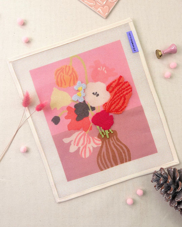 pink table needlepoint kit by ophelia pang as a work in progress
