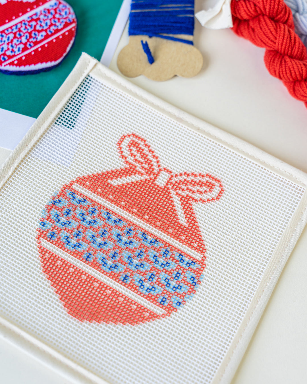 Merry Pine Bough Needlepoint Ornament Kit with canvas, threads and needles, by Unwind Studio