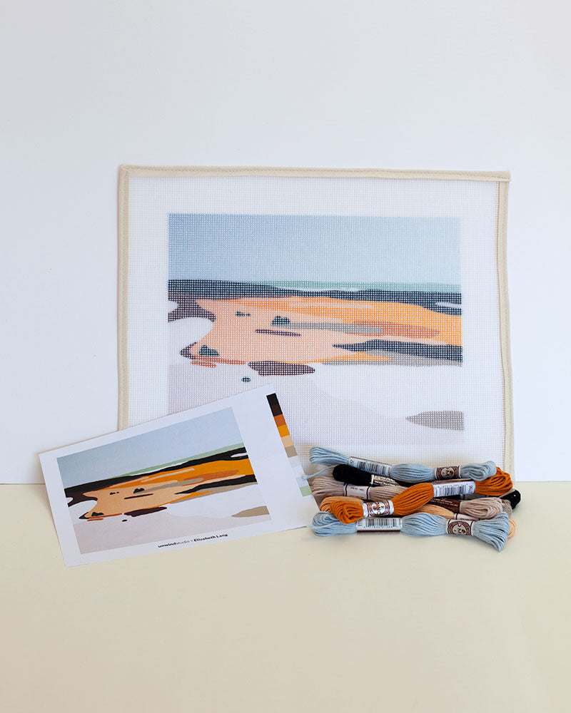 Needlepoint kit with illustration of sandy beach dunes and sky