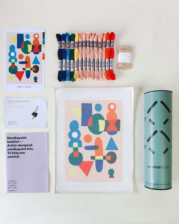 needlepoint kit with abstract illustration, with threads and packaging