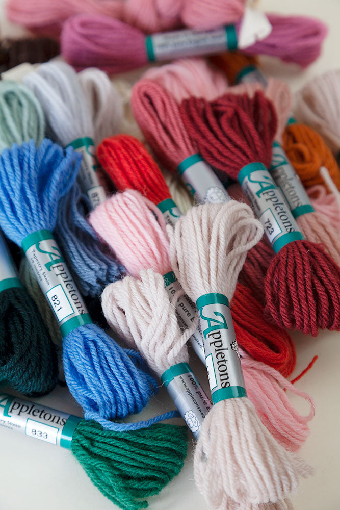 Tapestry wool skeins in various colors, for needlepoint stitching